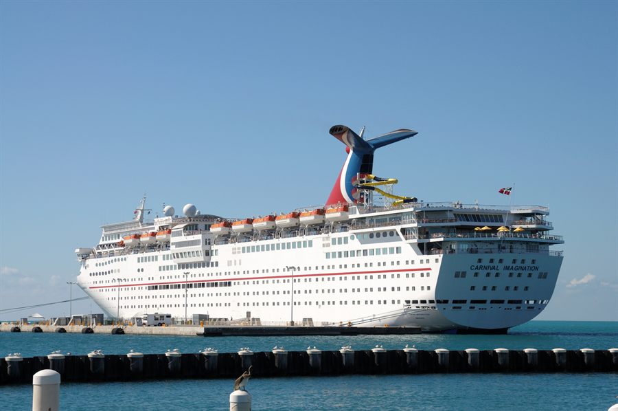 Fantasy-class Carnival ship docked at a cruise pier
